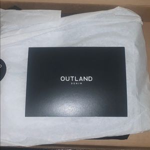 Outland denim black distressed jeans.